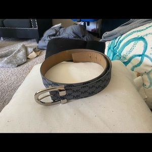 A Michael Kors synthetic leather belt barely worn